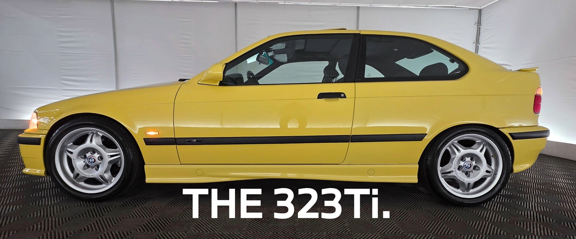 THE BMW 323TI M INDIVIDUAL DAKAR YELLOW